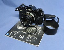Vintage Canon A-1 Black Body 35mm SLR Film Camera w/50mm f1.4 Lens  Filters VGC