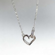 Women's Dainty Silver Hollow Heart Pendant Necklace with Sparkling Zircon Inlay