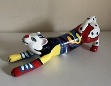 Playful hand-painted multi coloured pop art stretching cat sculpture 14 cms