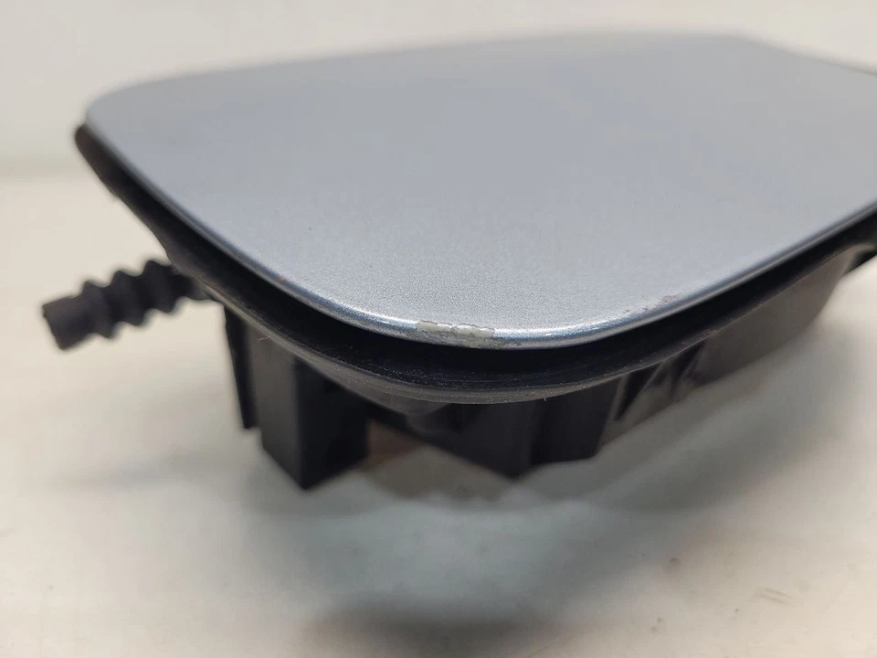 BMW X3 2005 (3,0 L/AT) puerta de llenado de combustible *azul/896* virutas de pintura Foto 2 de 4