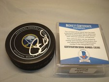 Phil Housley Signed Buffalo Sabres Official Game Hockey Puck Beckett BAS COA 1A