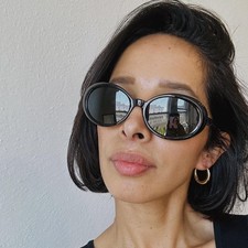 Authentic New Vintage women's 90s black oval sunglasses