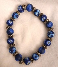 Handmade Clay Bead Stretch Bracelet Deep blue floral beads silver tone accents