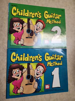 Mel Bay's Children's Guitar Method: Grade 1 and 2 - Paperbacks By Mel Bay - GOOD