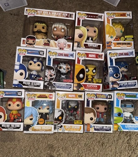 LOT OF 12 brand new Funko Pop! Viny marvel venom ninja turtle and more