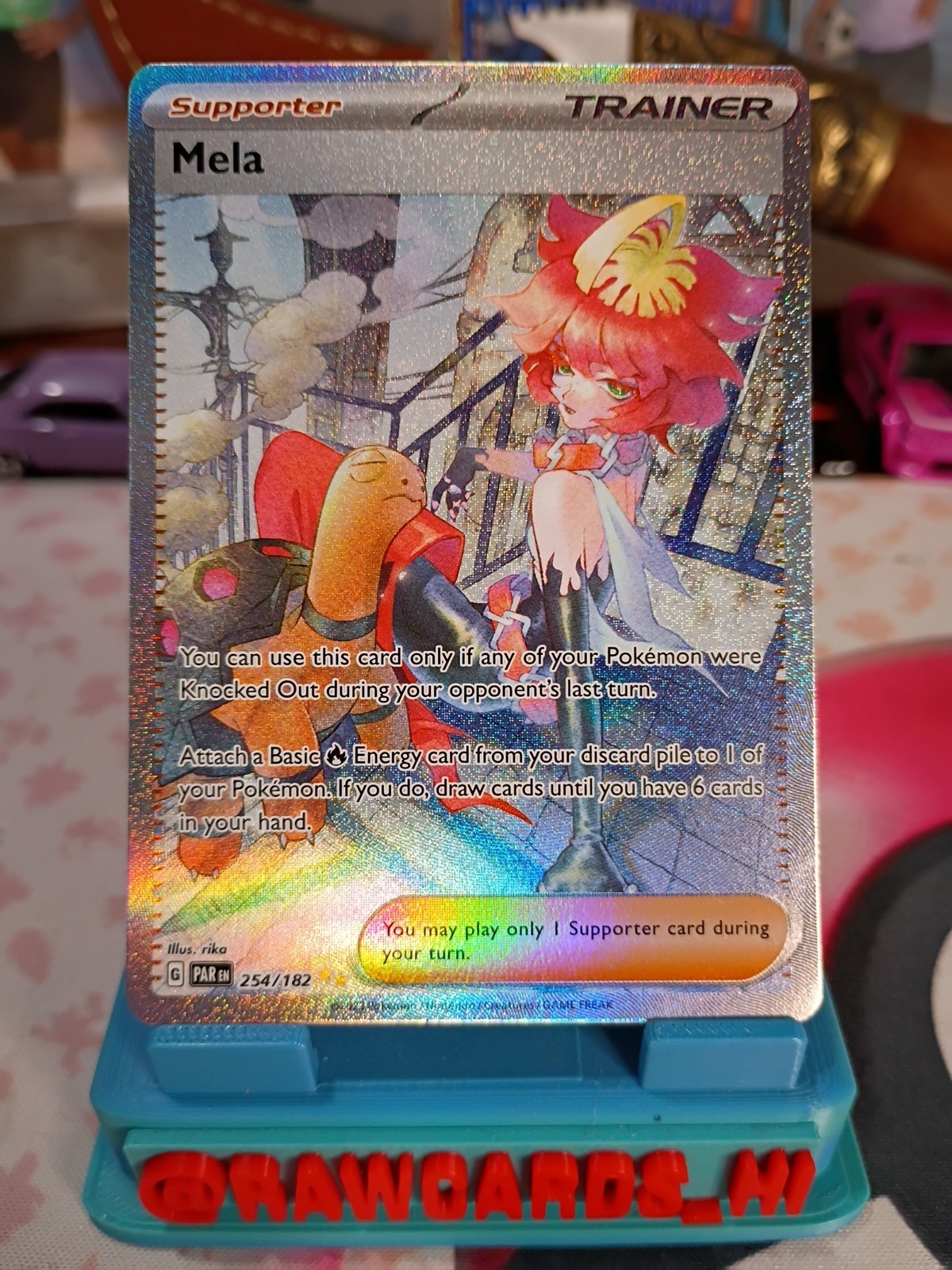 Pokemon Mela 254/182 SV04: Paradox Rift Holo Near Mint