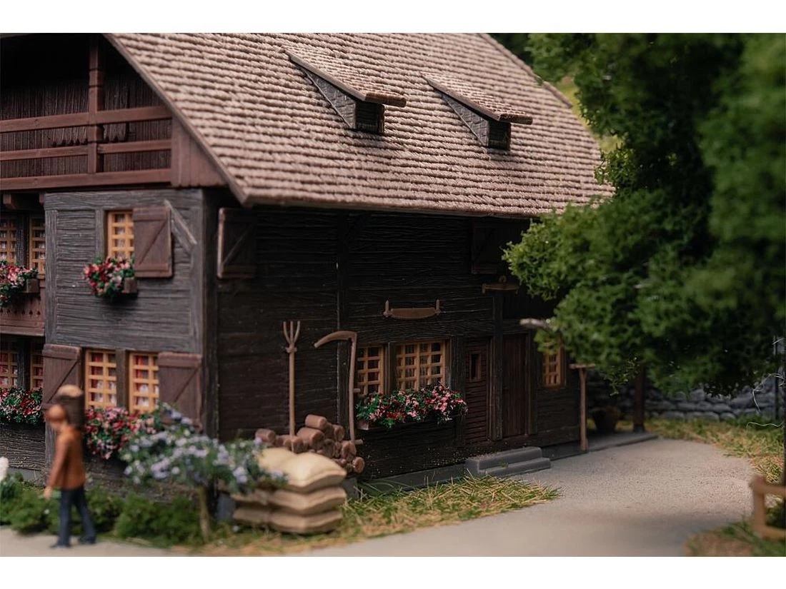 Faller 130012 H0 Jubiläumsmodell Uhrenmacherhaus mit Figur
