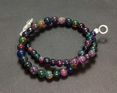 Natural Ethiopian Welo Fire Black Opal Plain Round 4-7mm Beads Gemstone Bracelet - Picture 3 of 5