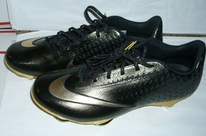 black and gold nike baseball cleats