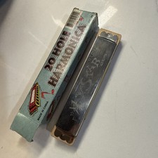 vintage Star Harmonica With It  s original graphic retail box.