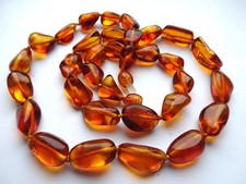 Elegante collana realizzata in ambra baltica naturale al 100%, di cognac 50cm