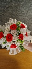 Bridal bouquet white carnations red roses crepe paper