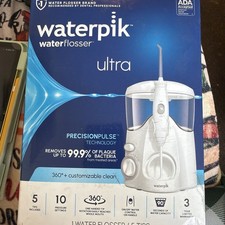 Waterpik Ultra Water Flosser with 10 Settings, 5 Tips, ADA Accepted, White