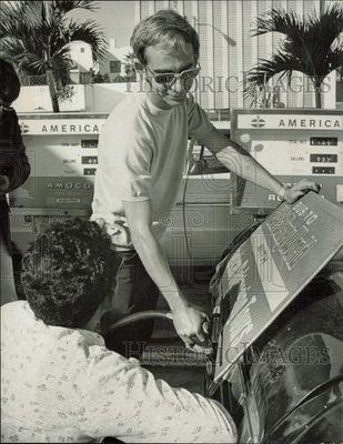 #ad #ad 1974 Press Photo Rafael Gonzalez Gets Gas at Amoco Station Miami Florida $24.99