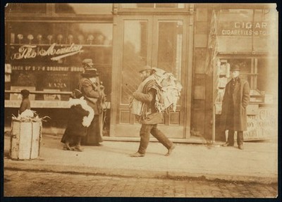 Old man carrying garments,Delaney Street,New York,Lewis Wickes Hine,1912