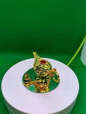 green and gold miniture genie lamp figurine