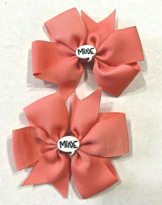 Beautiful Tangerine MINE Inspired Set of Pig Tail hair bows for girls.