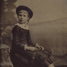 PORTRAIT OF ADORABLE GIRL IN HAT   BOOTS W/ PAINTED BACKDROP
