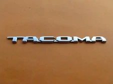 16 17 18 19 20 21 22 TOYOTA TACOMA SIDE DOOR (1) EMBLEM LOGO BADGE SIGN A41192