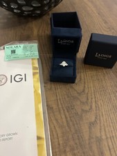 Oval/pear cut lab grown trilogy engagement ring size k platinum