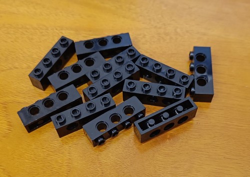 LEGO Technic - 12 x 3701 mattoncino technic brick 1 x 4 con 3 fori nero