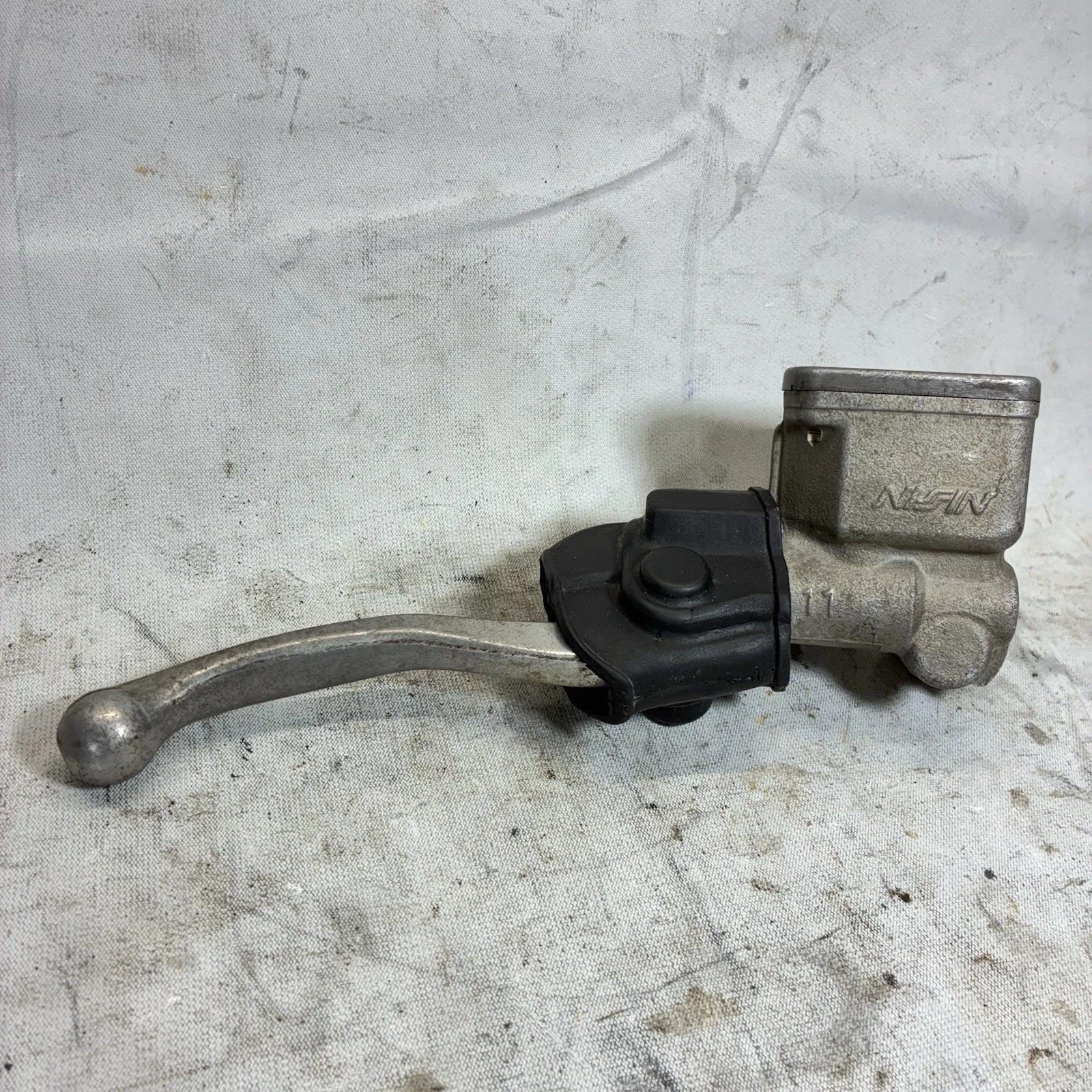 1999 SUZUKI 99-00 RM125 OEM NISSIN Front Brake Master Cylinder Lever 59600-36E11