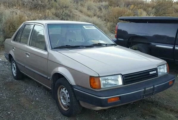 Lente de luz de esquina delantera derecha OEM 85-87 Mazda 323 BF Koito 230-61184 R FR Foto 4 de 4