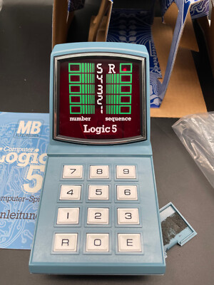 A collection of vintage toys and games including, a Computer Logic 5