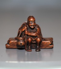 Antique Japanese netsuke of Sotoba Komachi the poet, 19th century. Edo. FINE.