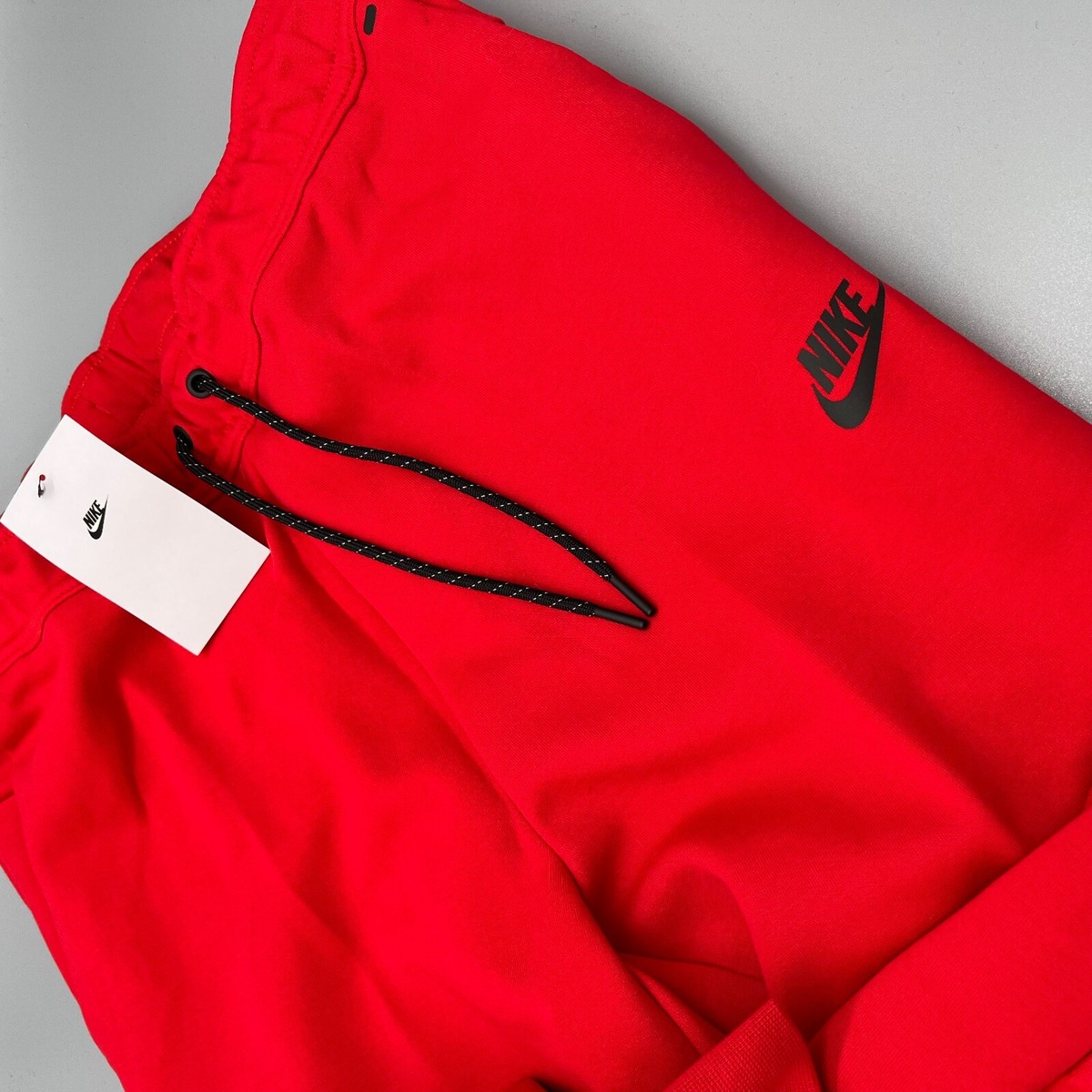 nike sportswear tech fleece joggers red