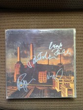autographed, Pink Floyd animals album all ban...