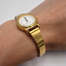 Vintage Lorus Womens Watch Quartz Japan Gold Tone Stretch Band Water Resistant