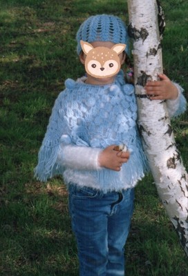 Stylish children's poncho with a hat for a girl, handmade.