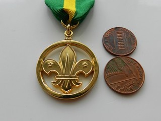 A BOXED MEDAL BOY SCOUTS MEDAL of MERIT E. CHALK JUNE 1981.