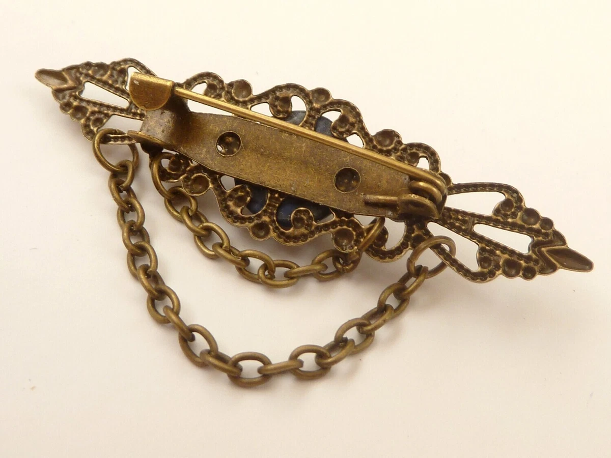 Filigrane Edelstein Brosche mit Lapislazuli Cabochon dunkelblau bronze