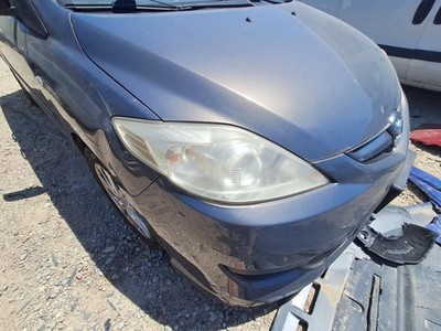Used Right Headlight Assembly fits: 2009 Mazda 5 xenon HID black trim Right Grad