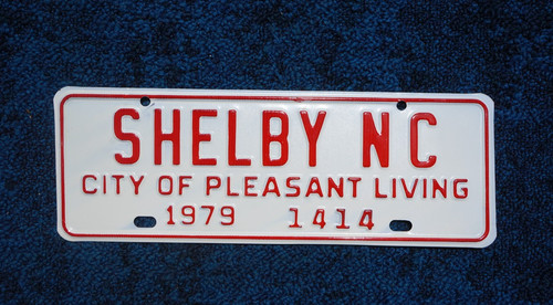 1979 SHELBY North Carolina License Plate Town Topper - CITY OF PLEASANT LIVING