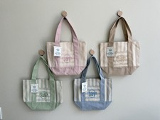 Mini bolsos de mano Trader Joe’s de lona a rayas pastel - Juego de 4 - Nuevos con etiquetas 2026 Limited