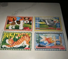 Melissa & Doug wooden puzzles. Includes 4 pet & 4 dinosaur puzzles. For ages 3+