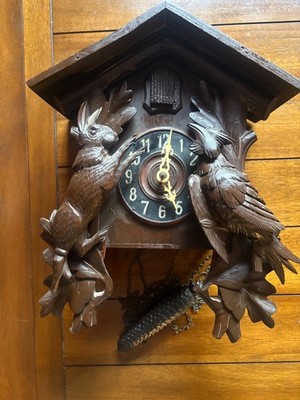 Vintage German Black Forest Carved Wood Hunter Themed Cuckoo Clock