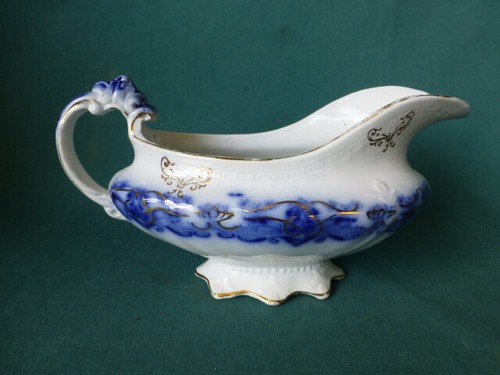 Antique Flow Blue Gravy Boat with Gold Trim