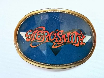 VINTAGE 1977 AEROSMITH PACIFICA BELT BUCKLE ROCK N ROLL COLLECTORS MEMORABILIA - Image 1 of 4