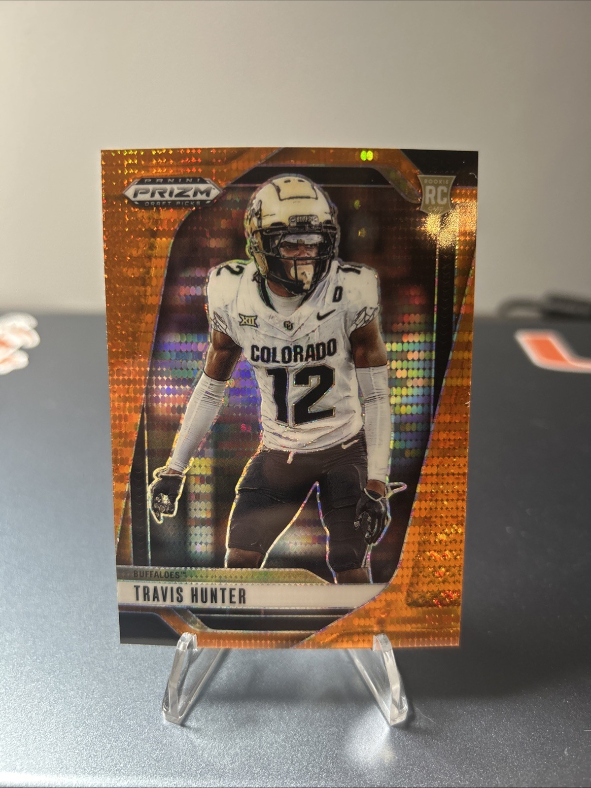 2025 Panini Prizm Draft Picks - Travis Hunter #20 - Orange Pulsar Prizm /75 (RC)