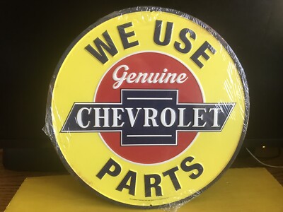 WE USE GENUINE CHEVROLET PARTS METAL SIGN 12  DIAMETER NEW IN PLASTIC FOR MANCAV