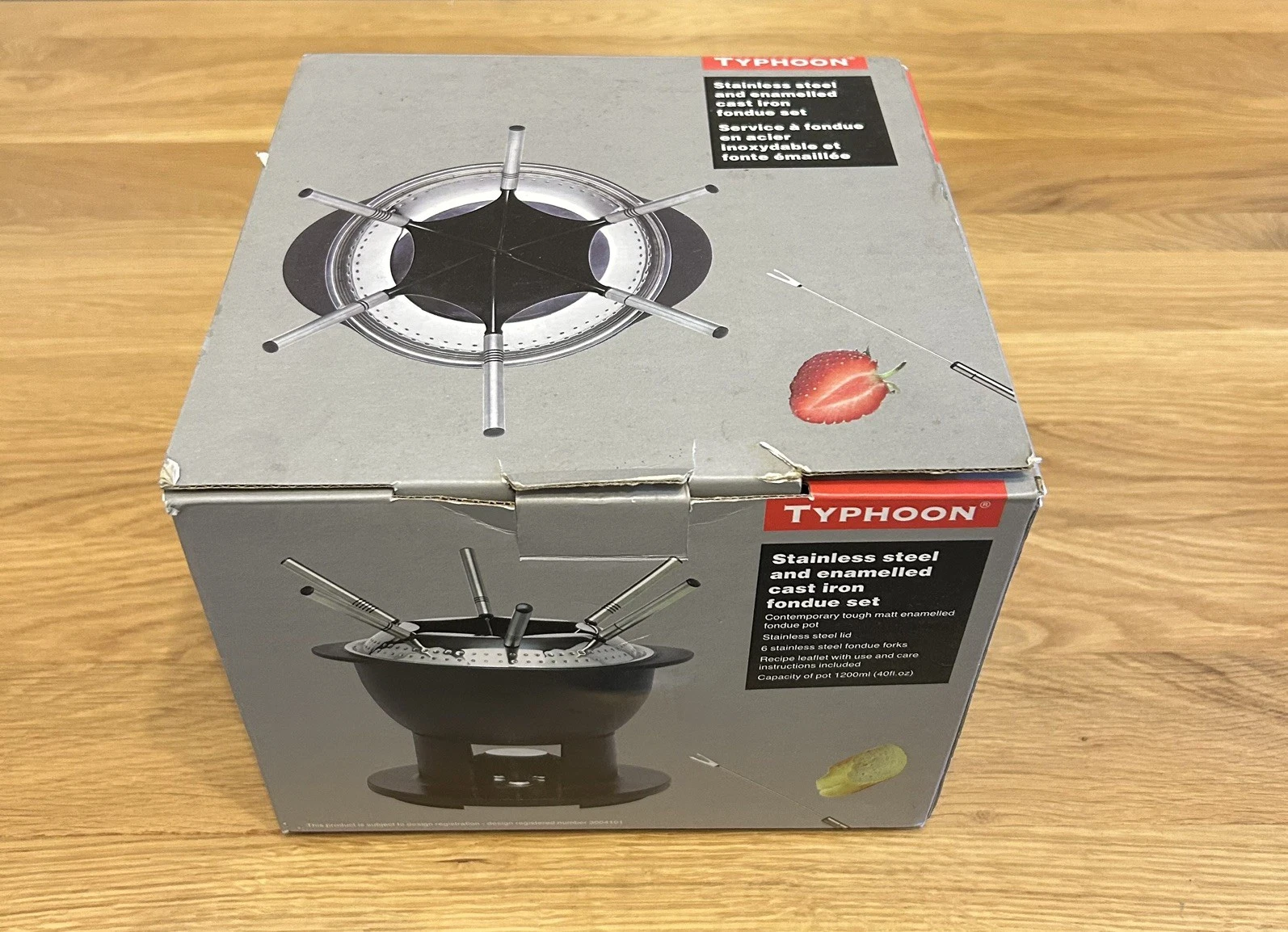Stainless steel and enamelled cast iron fondue set, new in box