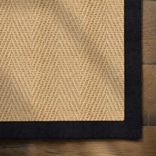 Tappeto in iuta naturale a spina di pesce con bordo in inchiostro di cotone