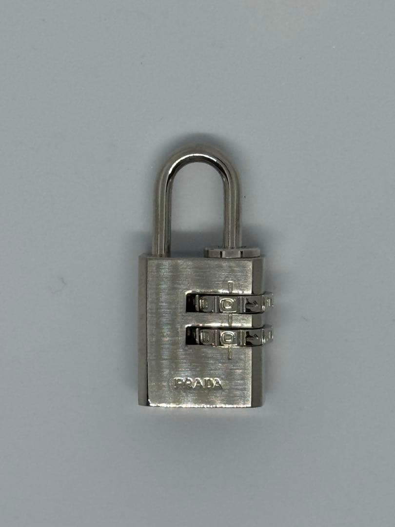 Authentic Prada Silvertone Brass Combination Lock… - image 1