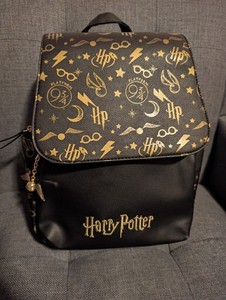 New Primark Black & Gold Harry Potter Themed Backpack Harry Potter fans are now available to carry around all  main image 3