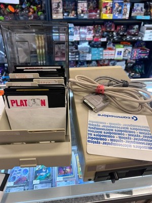 Commodore 64 5 1/4'' Floppy Disk Drive w/ cables and about 75 Games (Untested) UA