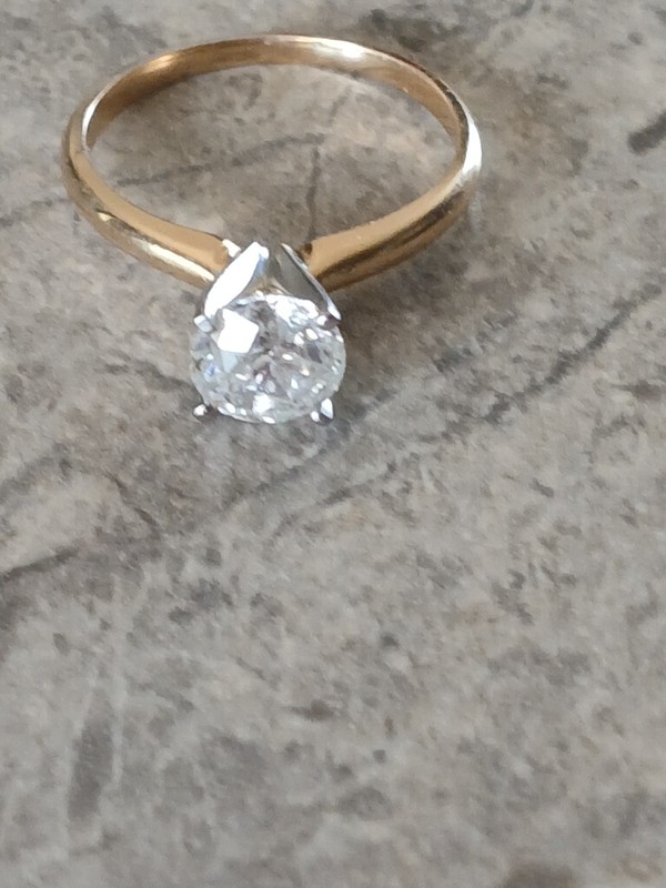 14K gold ring size 6 with a 1 Ct natural Diamond